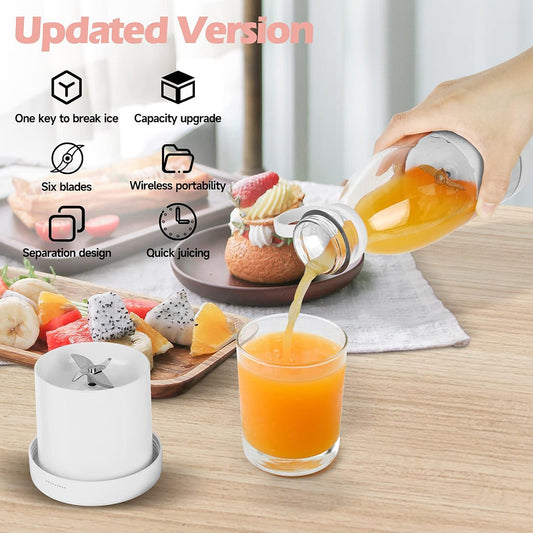 Portable USB Blender making fresh fruit juice with strawberries, oranges, and berries